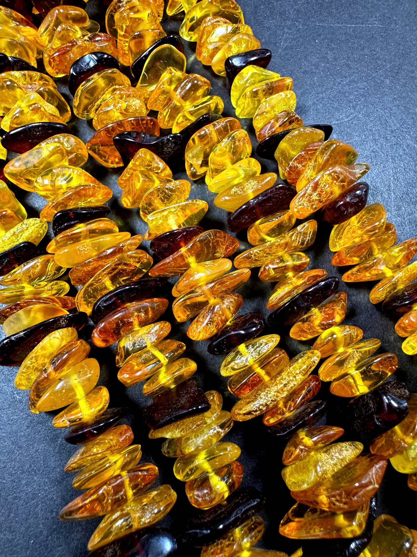 AAA Baltic Gold bead . Beautiful natural honey gold yellow color. Not treated . Unique shape . Excellent quality . Full strand 15.5