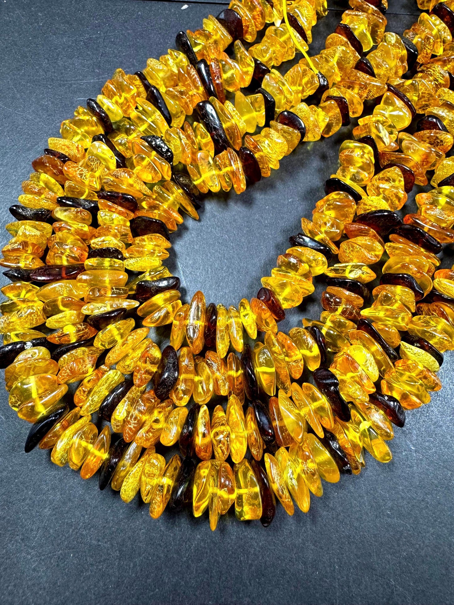 AAA Baltic Gold bead . Beautiful natural honey gold yellow color. Not treated . Unique shape . Excellent quality . Full strand 15.5
