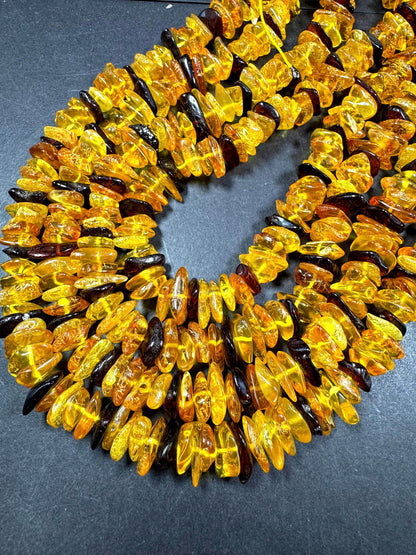 AAA Baltic Gold bead . Beautiful natural honey gold yellow color. Not treated . Unique shape . Excellent quality . Full strand 15.5