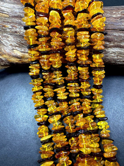 AAA Baltic Gold bead . Beautiful natural honey gold yellow color. Not treated . Unique shape . Excellent quality . Full strand 15.5