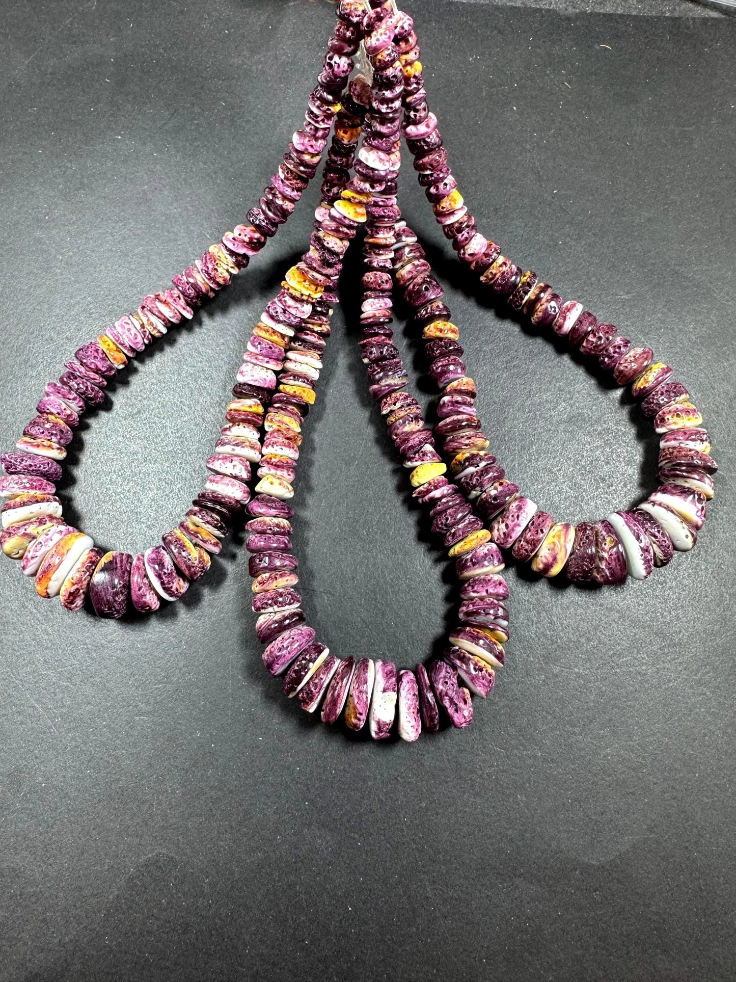 AAA natural spiny oyster shell bead . great quality . beautiful natural dark purple color. not treated .excellent quality spiny shell beads