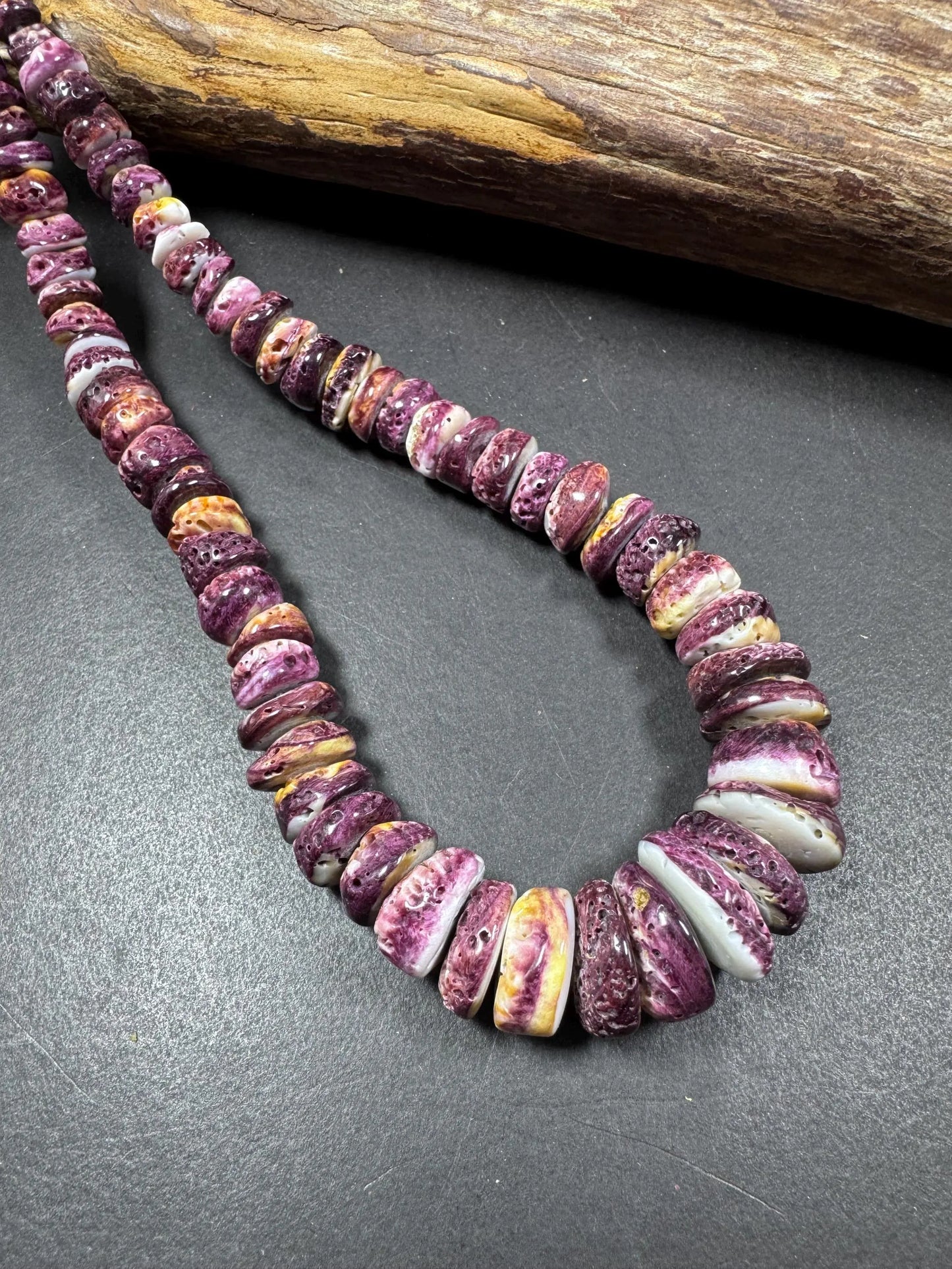 AAA natural spiny oyster shell bead . great quality . beautiful natural dark purple color. not treated .excellent quality spiny shell beads