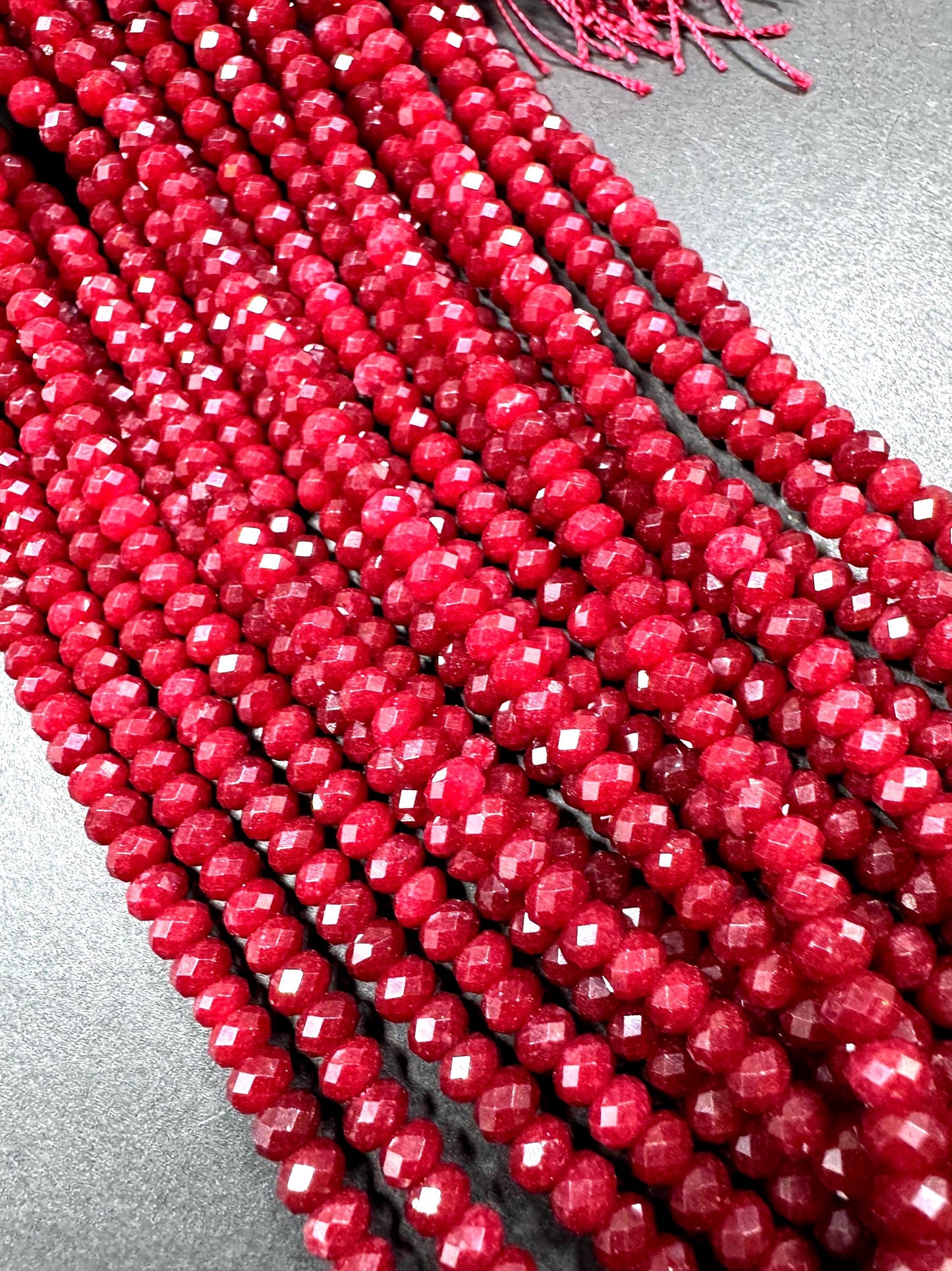 Natural gemstone bead. Red  jade stone bead. faceted rondelle shape beads. excellent quality . full strand 15.5”