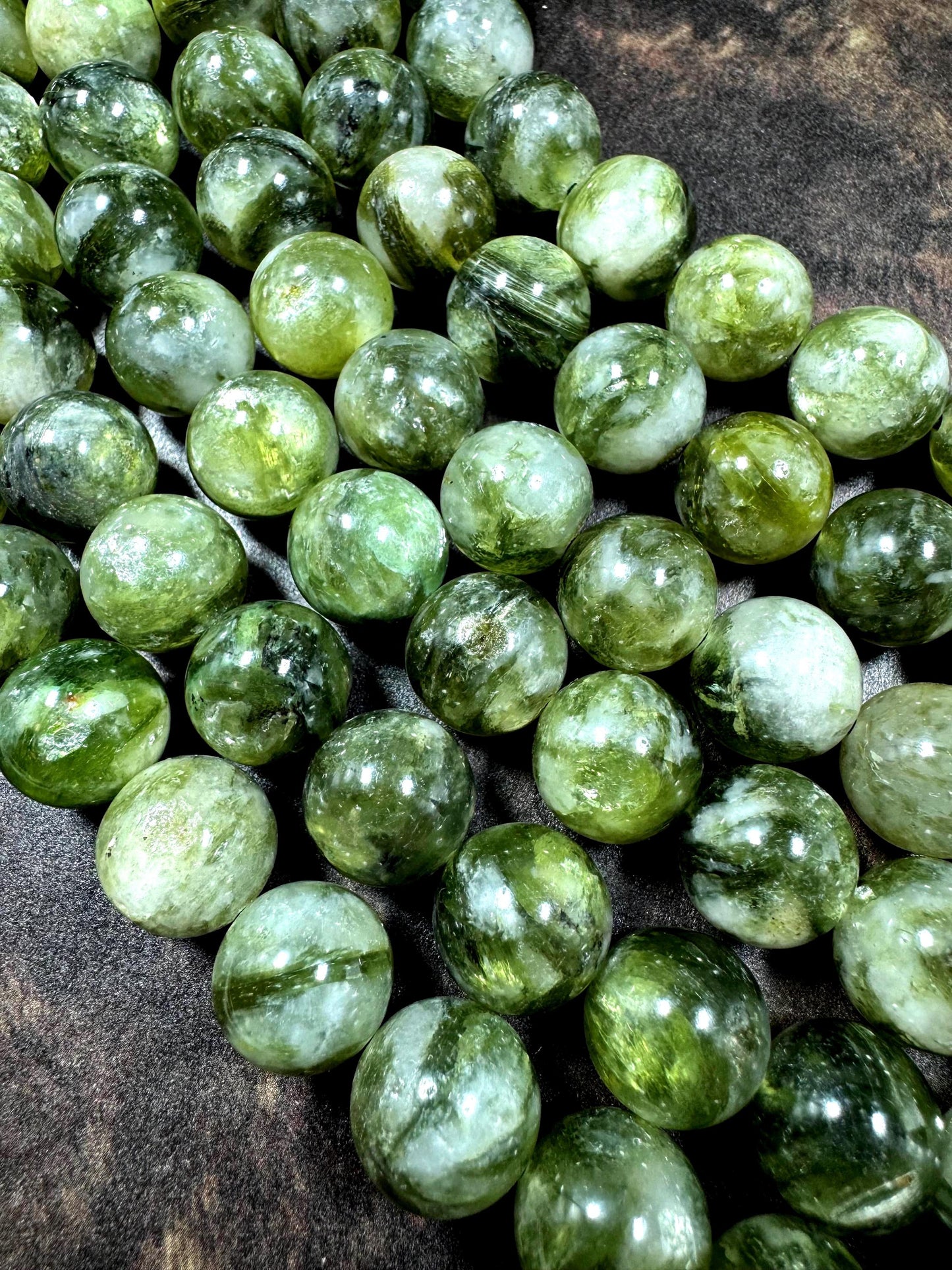 Natural green lepidolite gemstone beads . beautiful green color . not treated . excellent quality. full strand 15.5”