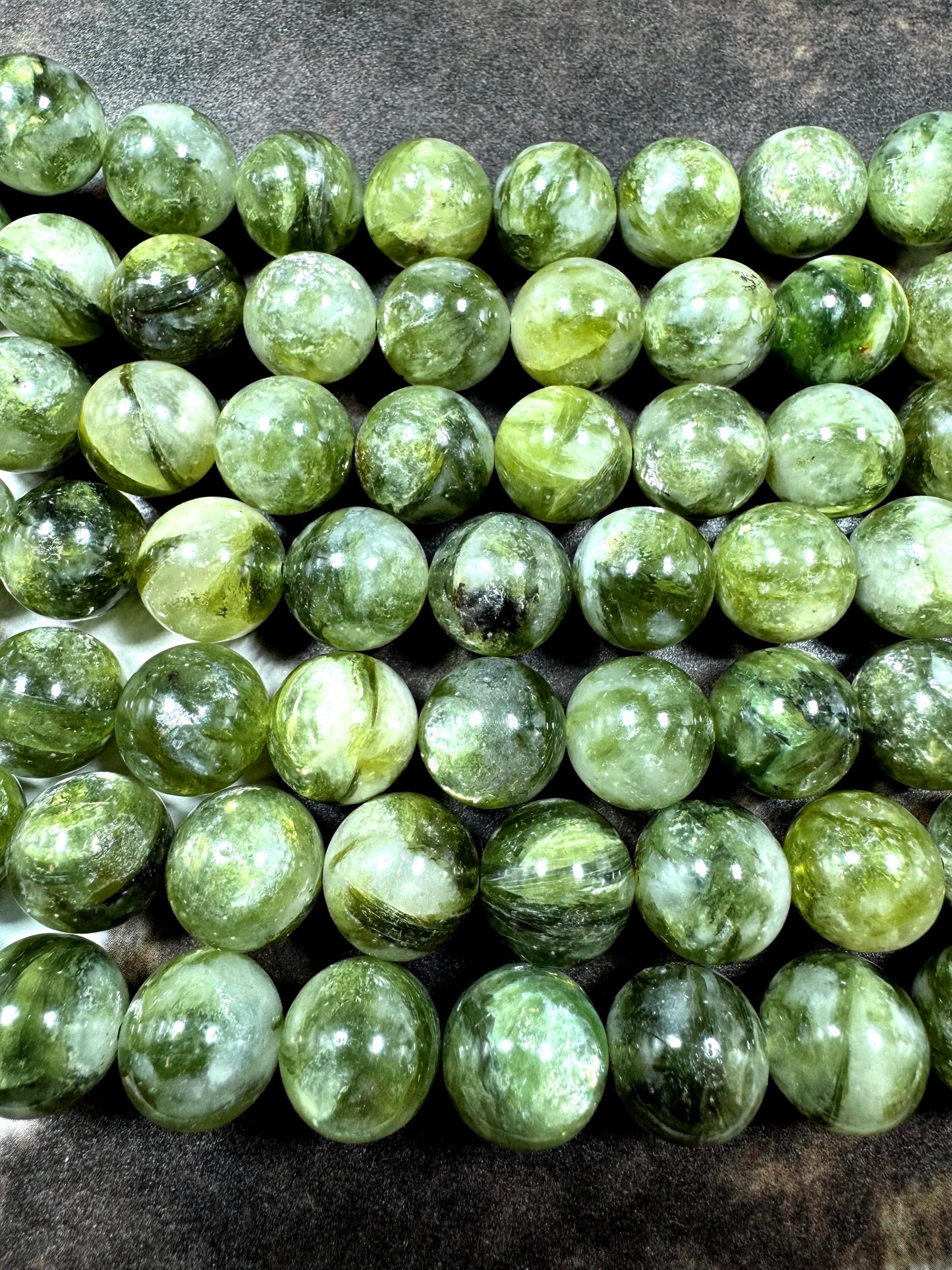 Natural green lepidolite gemstone beads . beautiful green color . not treated . excellent quality. full strand 15.5”