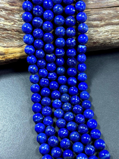 100% Natural lapis lazuli gemstone bead. smooth round beads. gorgeous natural royal blue color. not treated . excellent quality .full strand