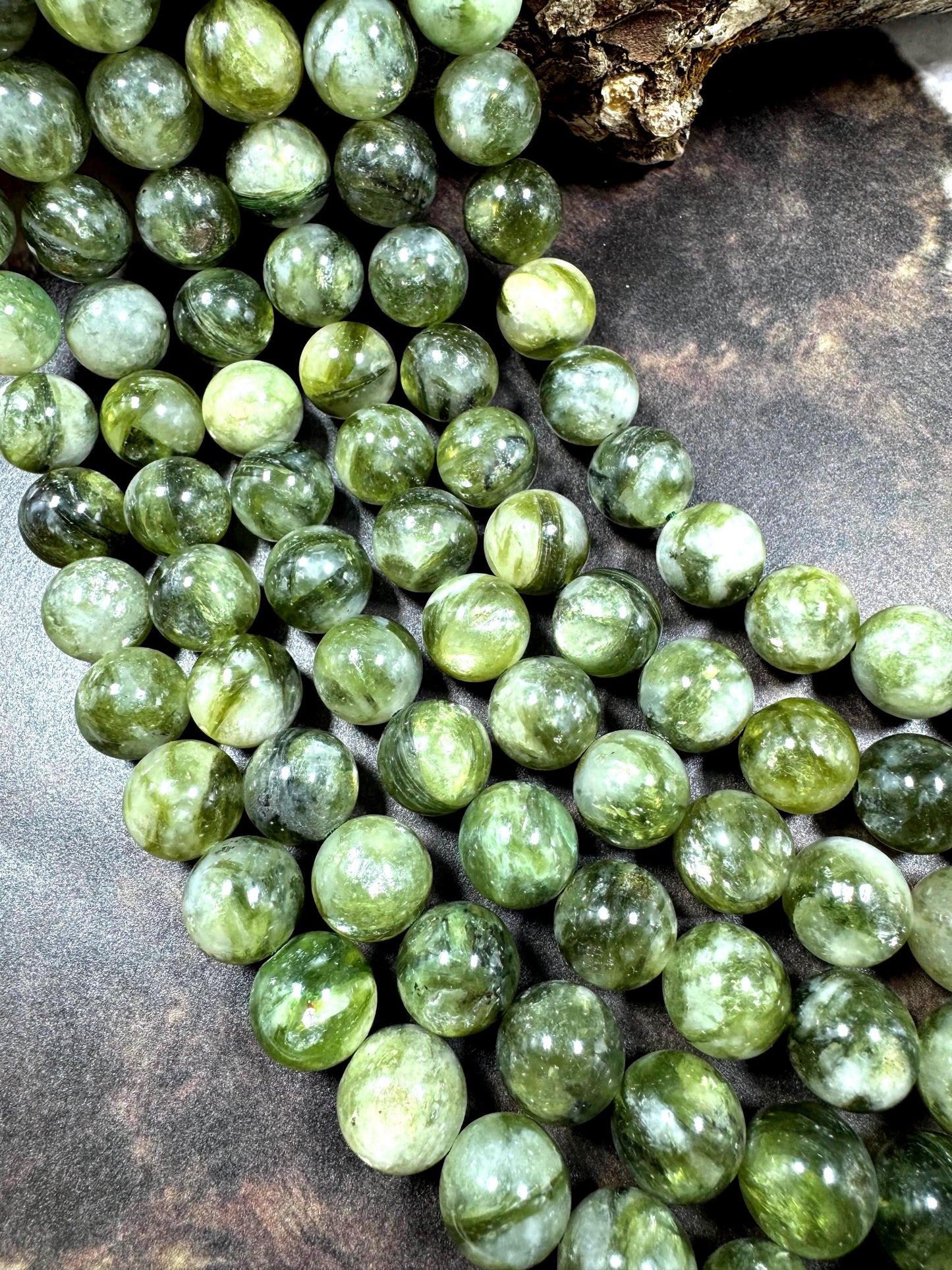 Natural green lepidolite gemstone beads . beautiful green color . not treated . excellent quality. full strand 15.5”