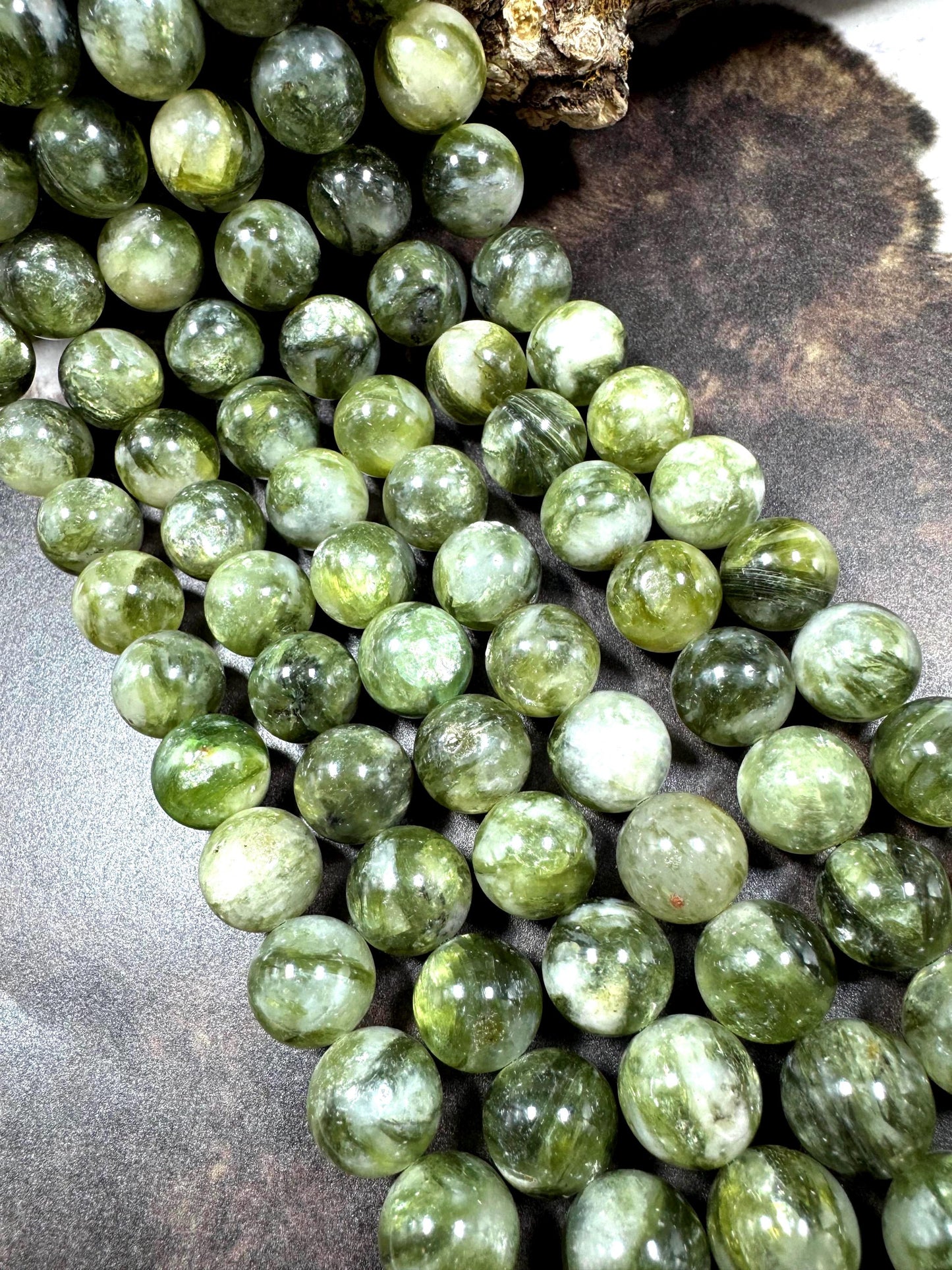 Natural green lepidolite gemstone beads . beautiful green color . not treated . excellent quality. full strand 15.5”