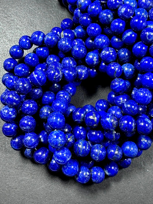100% Natural lapis lazuli gemstone bead. smooth round beads. gorgeous natural royal blue color. not treated . excellent quality .full strand