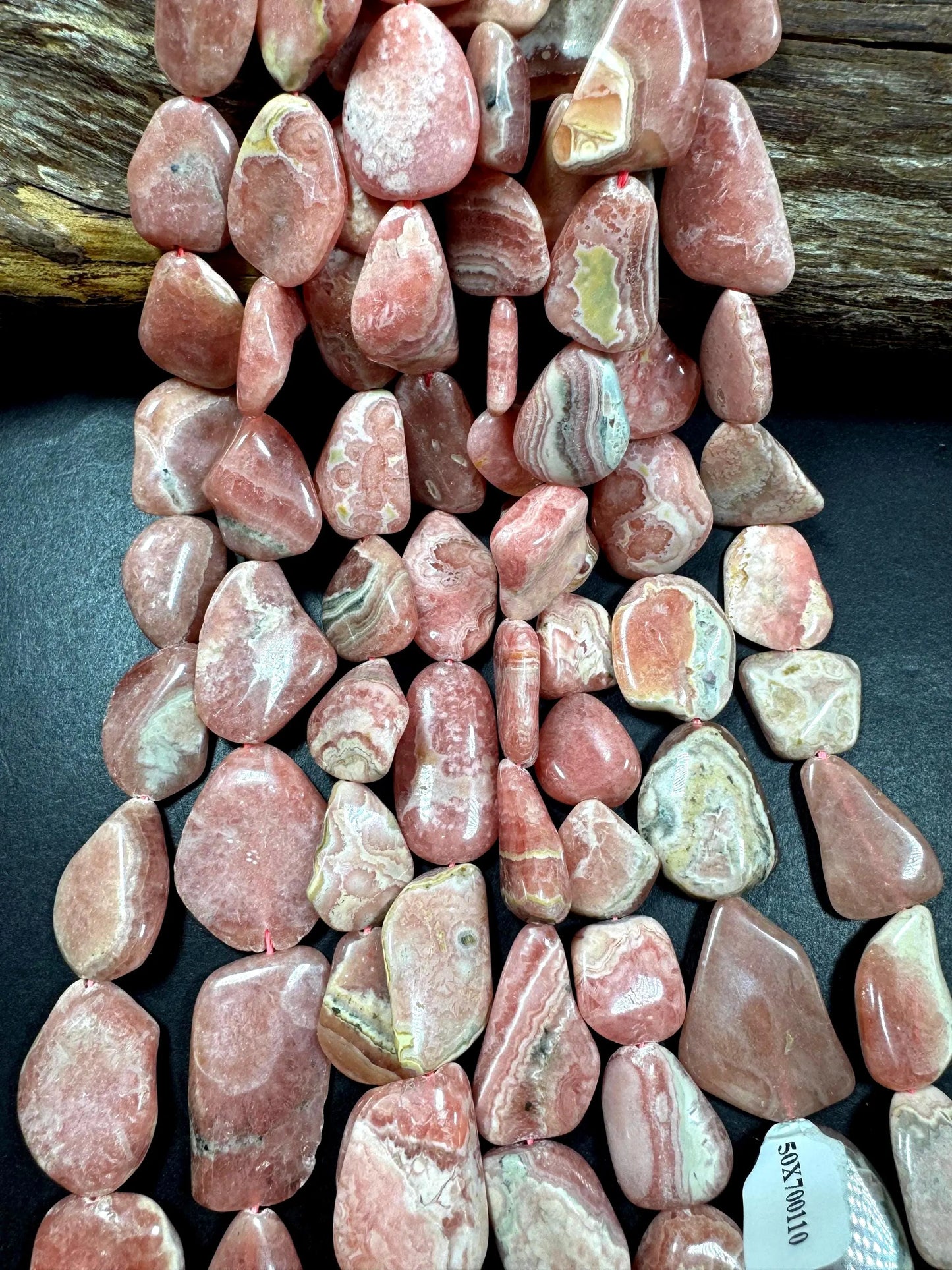 AAA Natural Rhodochrosite Gemstone Bead. Freedom nugget shape beautiful Natural rose pink color. Excellent quality. Full strand 15.5”