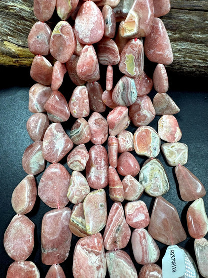 AAA Natural Rhodochrosite Gemstone Bead. Freedom nugget shape beautiful Natural rose pink color. Excellent quality. Full strand 15.5”