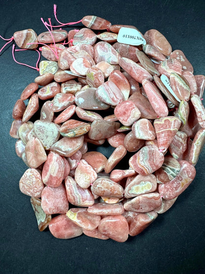 AAA Natural Rhodochrosite Gemstone Bead. Freedom nugget shape beautiful Natural rose pink color. Excellent quality. Full strand 15.5”