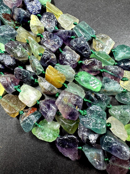 AAA Natural Fluorite Gemstone Bead. Freedom nugget shape beautiful Natural green purple color. Excellent quality. Full strand 15.5”