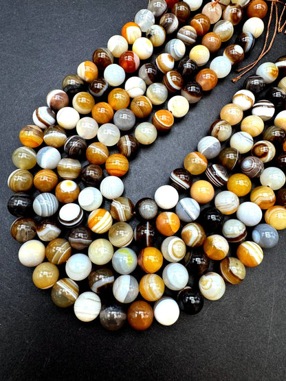 Natural Botswana Gemstone bead. Smooth round bead. Gorgeous brown Botswana bead. Excellent quality. Full strand 15.5