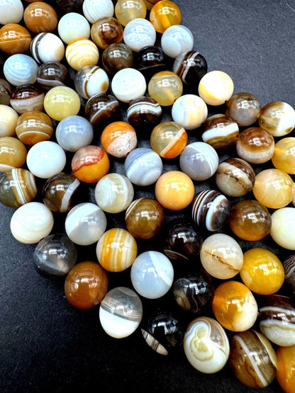 Natural Botswana Gemstone bead. Smooth round bead. Gorgeous brown Botswana bead. Excellent quality. Full strand 15.5