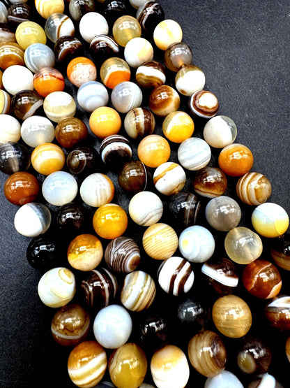 Natural Botswana Gemstone bead. Smooth round bead. Gorgeous brown Botswana bead. Excellent quality. Full strand 15.5