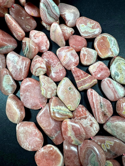 AAA Natural Rhodochrosite Gemstone Bead. Freedom nugget shape beautiful Natural rose pink color. Excellent quality. Full strand 15.5”