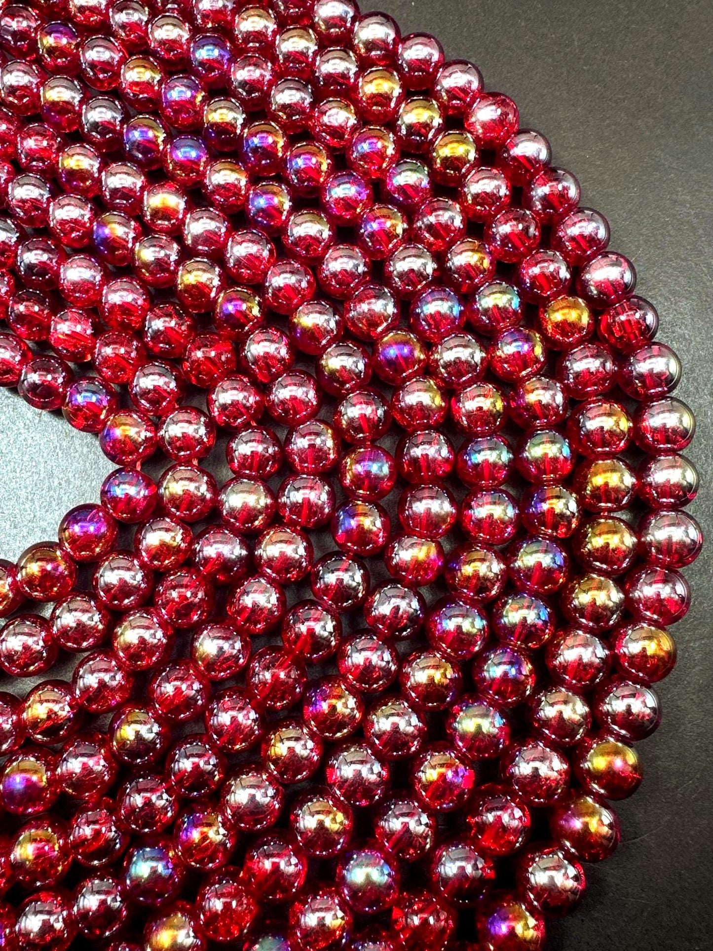 Red Crystal Glass Smooth Bead with Rainbow Flash. High quality crystal bead! Full strand 15.5