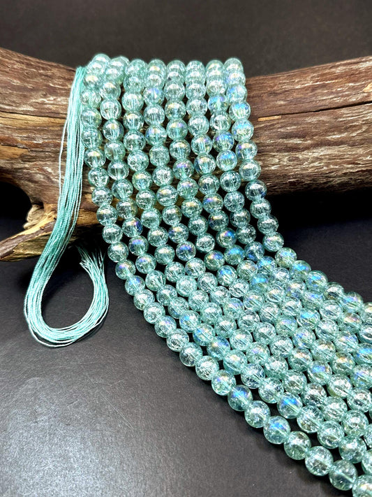 Mint Green Crystal Glass Smooth Bead with Rainbow Flash. High quality crystal bead! Full strand 15.5