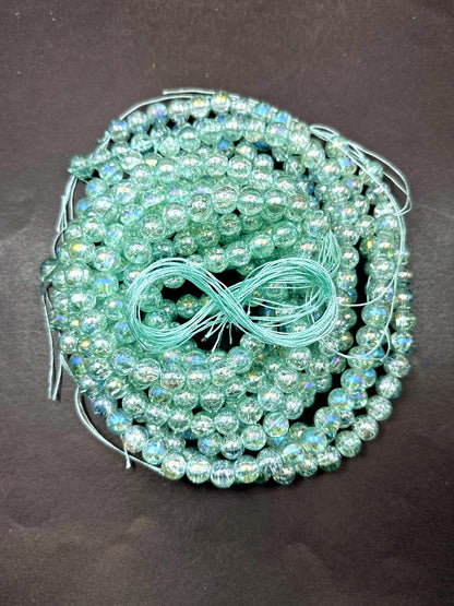 Mint Green Crystal Glass Smooth Bead with Rainbow Flash. High quality crystal bead! Full strand 15.5