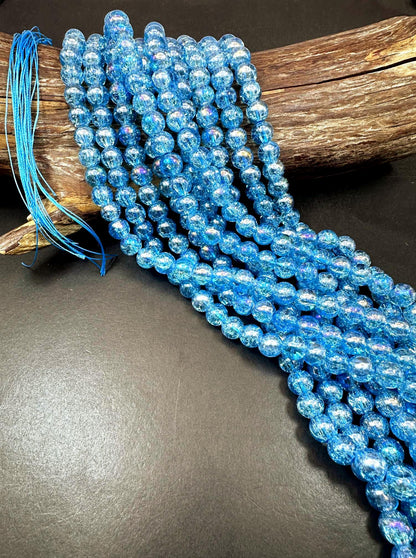 Light Blue Crystal Glass Smooth Bead with Rainbow Flash. High quality crystal bead! Full strand 15.5
