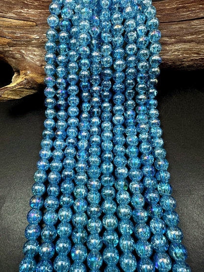 Light Blue Crystal Glass Smooth Bead with Rainbow Flash. High quality crystal bead! Full strand 15.5