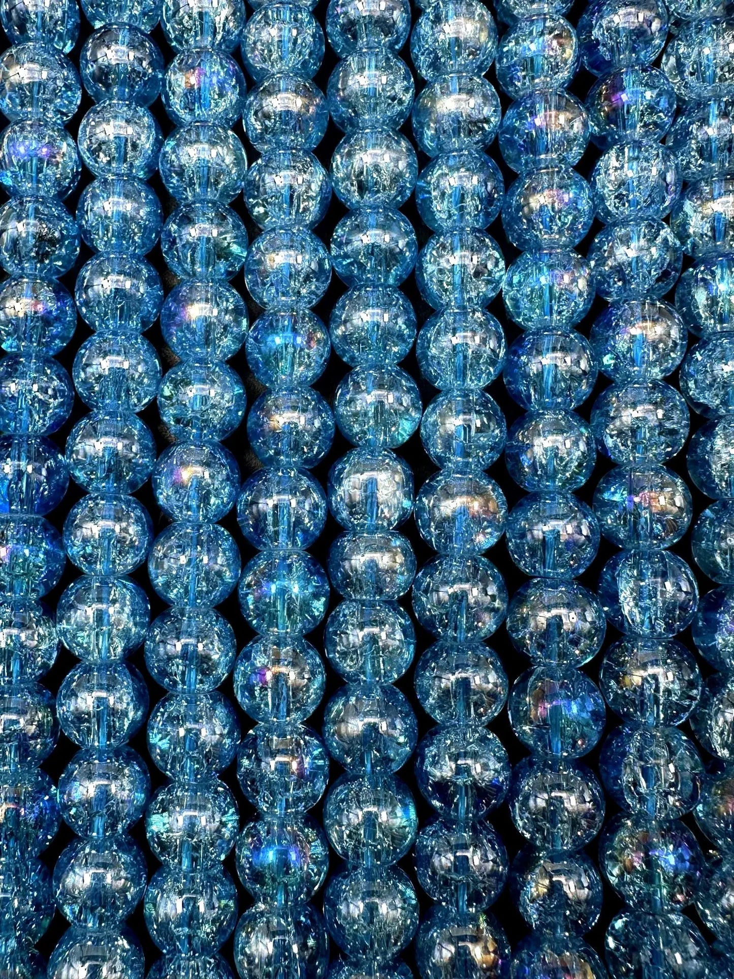 Light Blue Crystal Glass Smooth Bead with Rainbow Flash. High quality crystal bead! Full strand 15.5