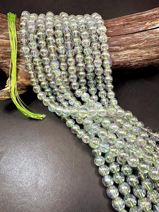 Clear Green Crystal Glass Smooth Bead with Rainbow Flash. High quality crystal bead! Full strand 15.5