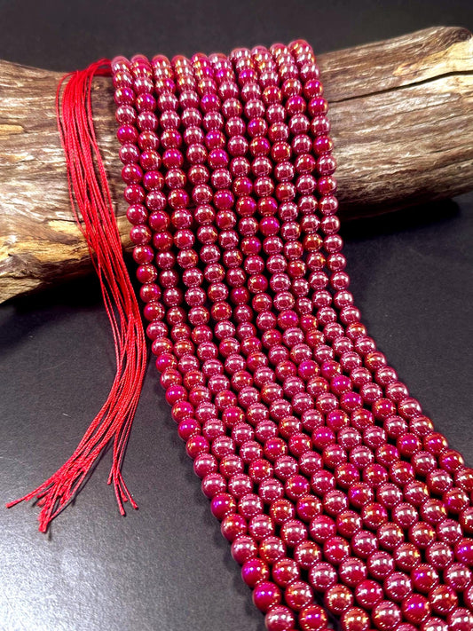 Beautiful Red Crystal Glass Pearl Bead. Round shape bead. Gorgeous high quality crystal bead! Full strand 15.5"