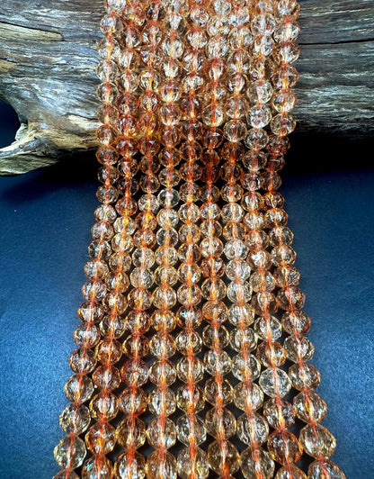 Beautiful Crackle Crystal glass bead. Faceted round shape bead. Gorgeous light orange color, High quality crystal bead! Full strand 15.5