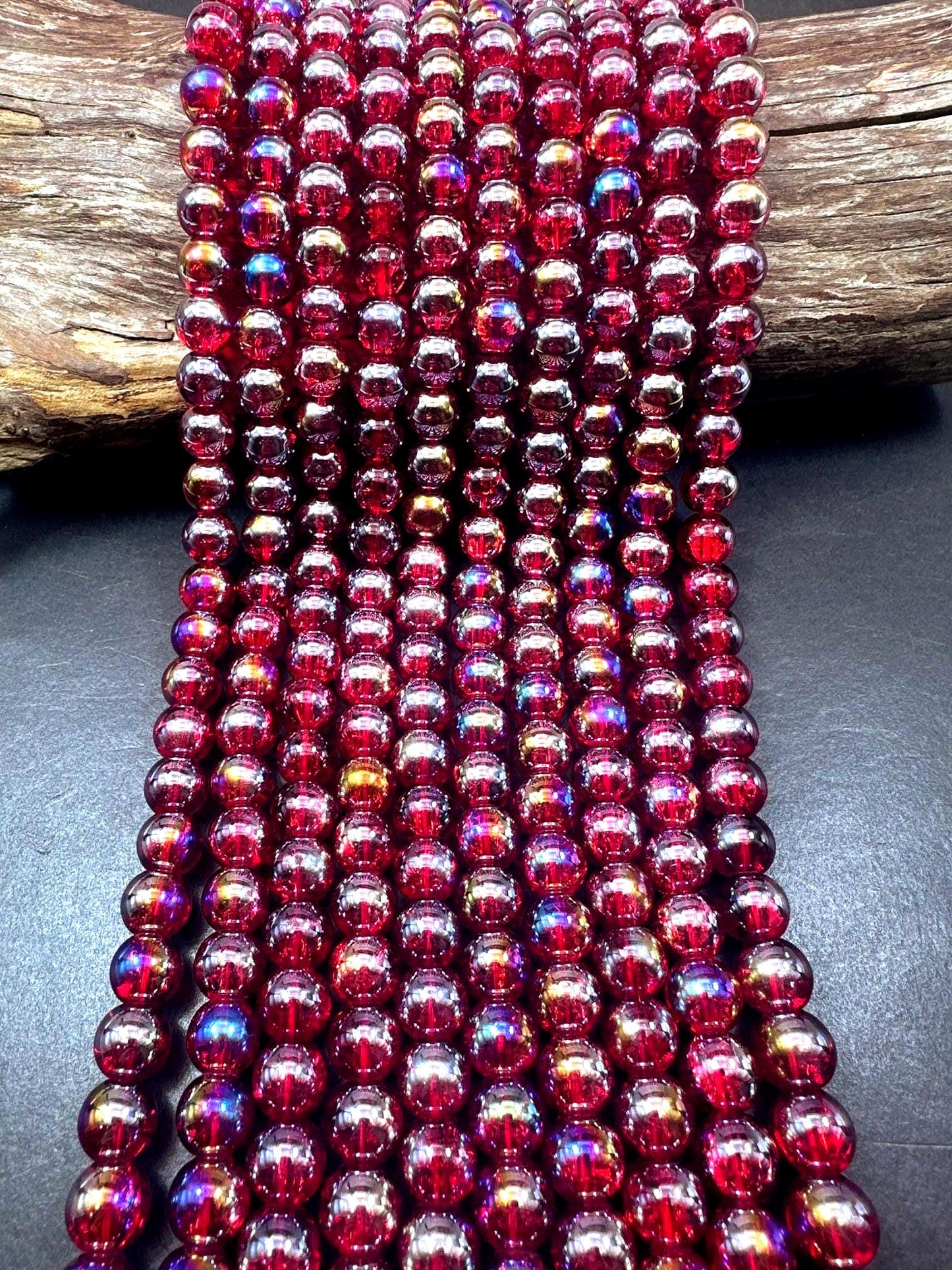 Red Crystal Glass Smooth Bead with Rainbow Flash. High quality crystal bead! Full strand 15.5