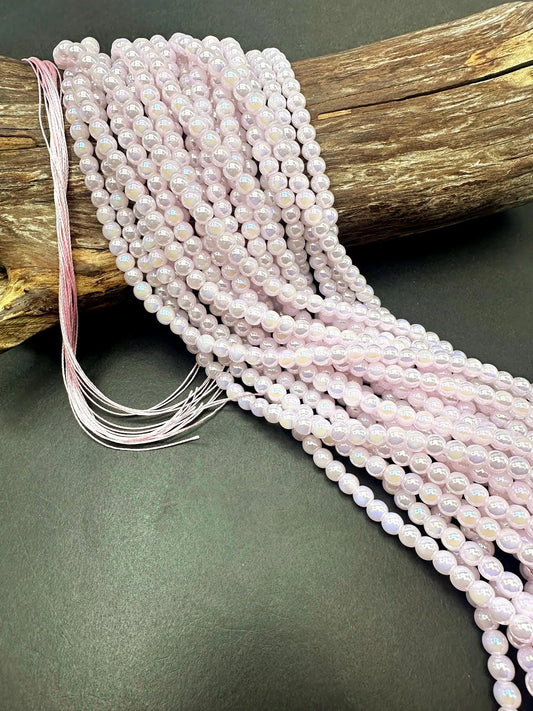 Beautiful Light Pink Crystal Glass Pearl Bead. Round shape bead. Gorgeous high quality crystal bead! Full strand 15.5"