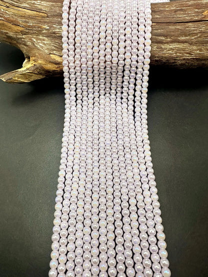 Beautiful Light Pink Crystal Glass Pearl Bead. Round shape bead. Gorgeous high quality crystal bead! Full strand 15.5"