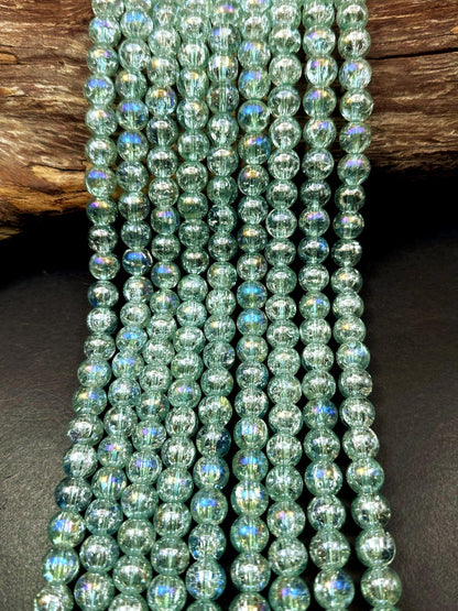 Mint Green Crystal Glass Smooth Bead with Rainbow Flash. High quality crystal bead! Full strand 15.5