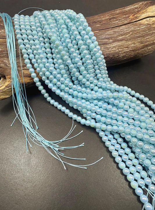 Beautiful Sky Blue Crystal Glass Pearl Bead. Round shape bead. Gorgeous high quality crystal bead! Full strand 15.5"