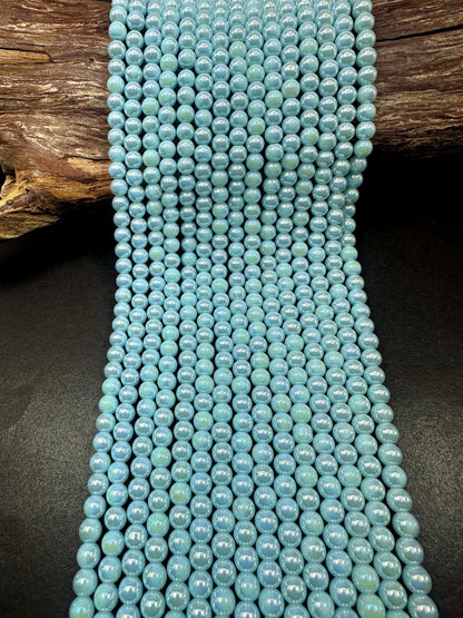 Beautiful Sky Blue Crystal Glass Pearl Bead. Round shape bead. Gorgeous high quality crystal bead! Full strand 15.5"