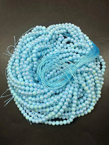Beautiful Sky Blue Crystal Glass Pearl Bead. Round shape bead. Gorgeous high quality crystal bead! Full strand 15.5"