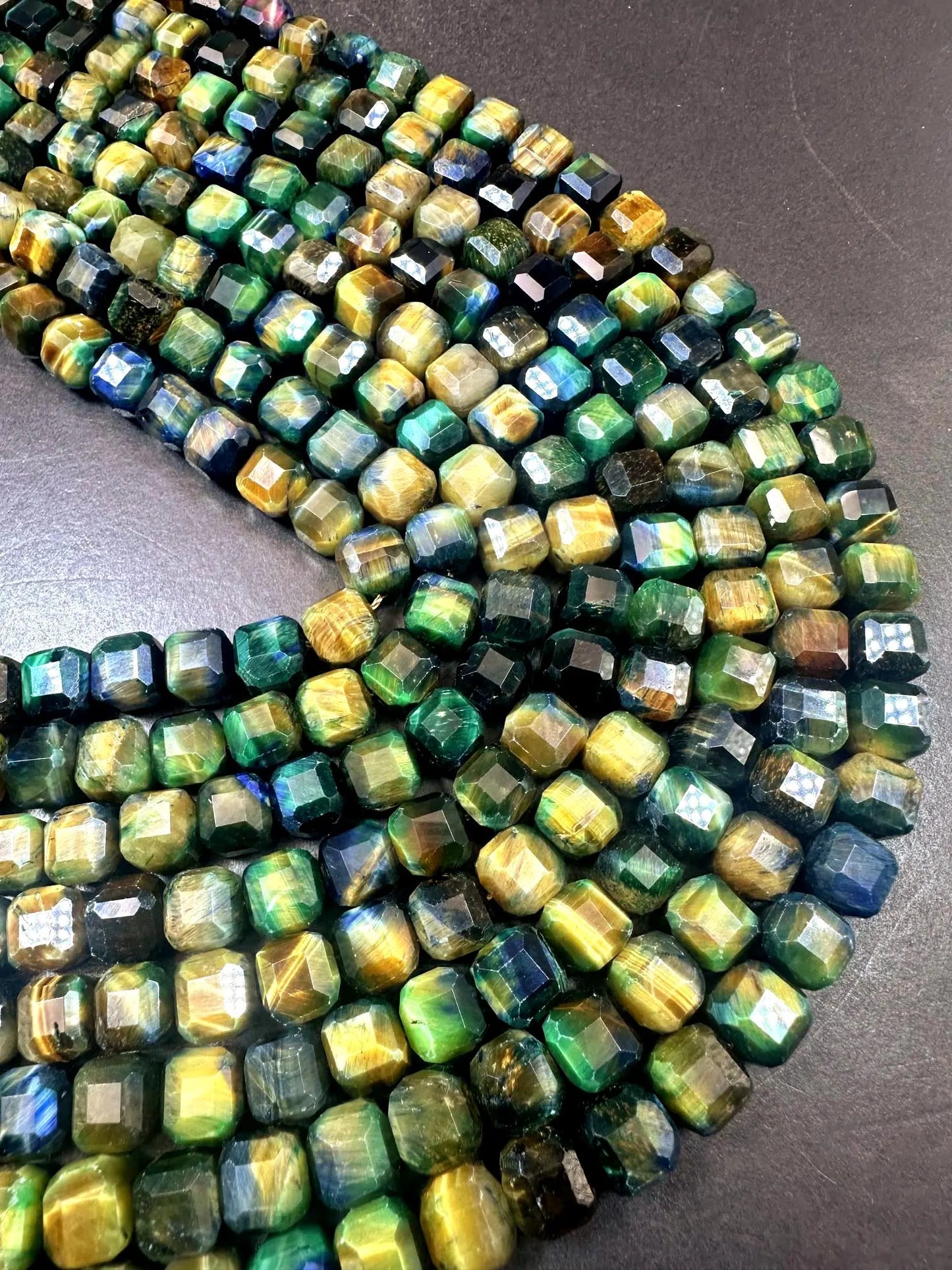 Galaxy tiger eye stone bead. Faceted 8mm cube shape bead . Gorgeous green multi color tiger eye gemstone .Unique looking tiger eye bead
