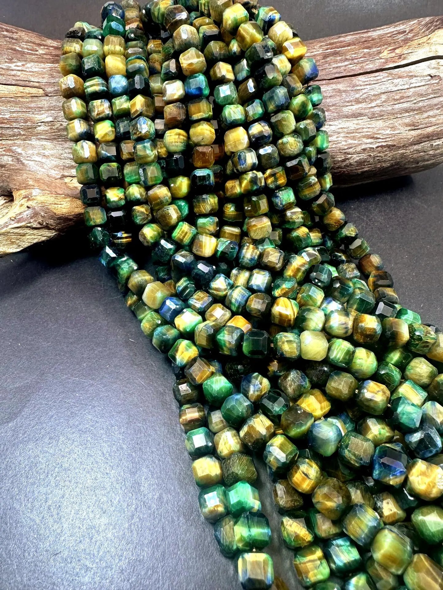 Galaxy tiger eye stone bead. Faceted 8mm cube shape bead . Gorgeous green multi color tiger eye gemstone .Unique looking tiger eye bead