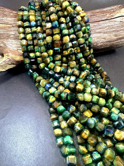Galaxy tiger eye stone bead. Faceted 8mm cube shape bead . Gorgeous green multi color tiger eye gemstone .Unique looking tiger eye bead