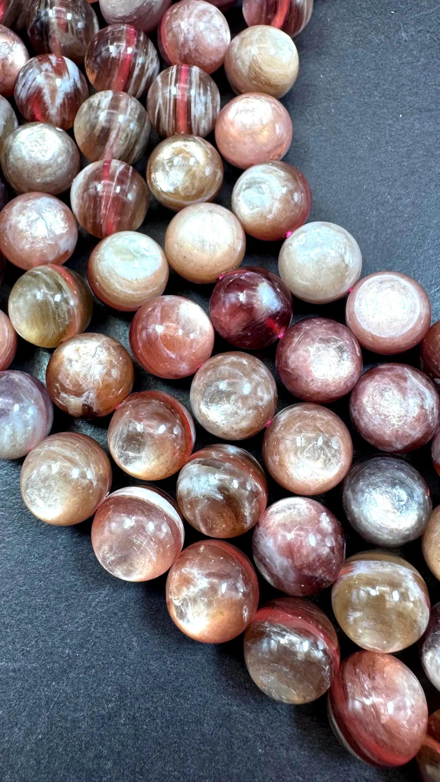 Natural lepidolite mica gemstone beads . Gorgeous natural rainbow flash lepidolite bead. Excellent quality . Full strand 15.5”