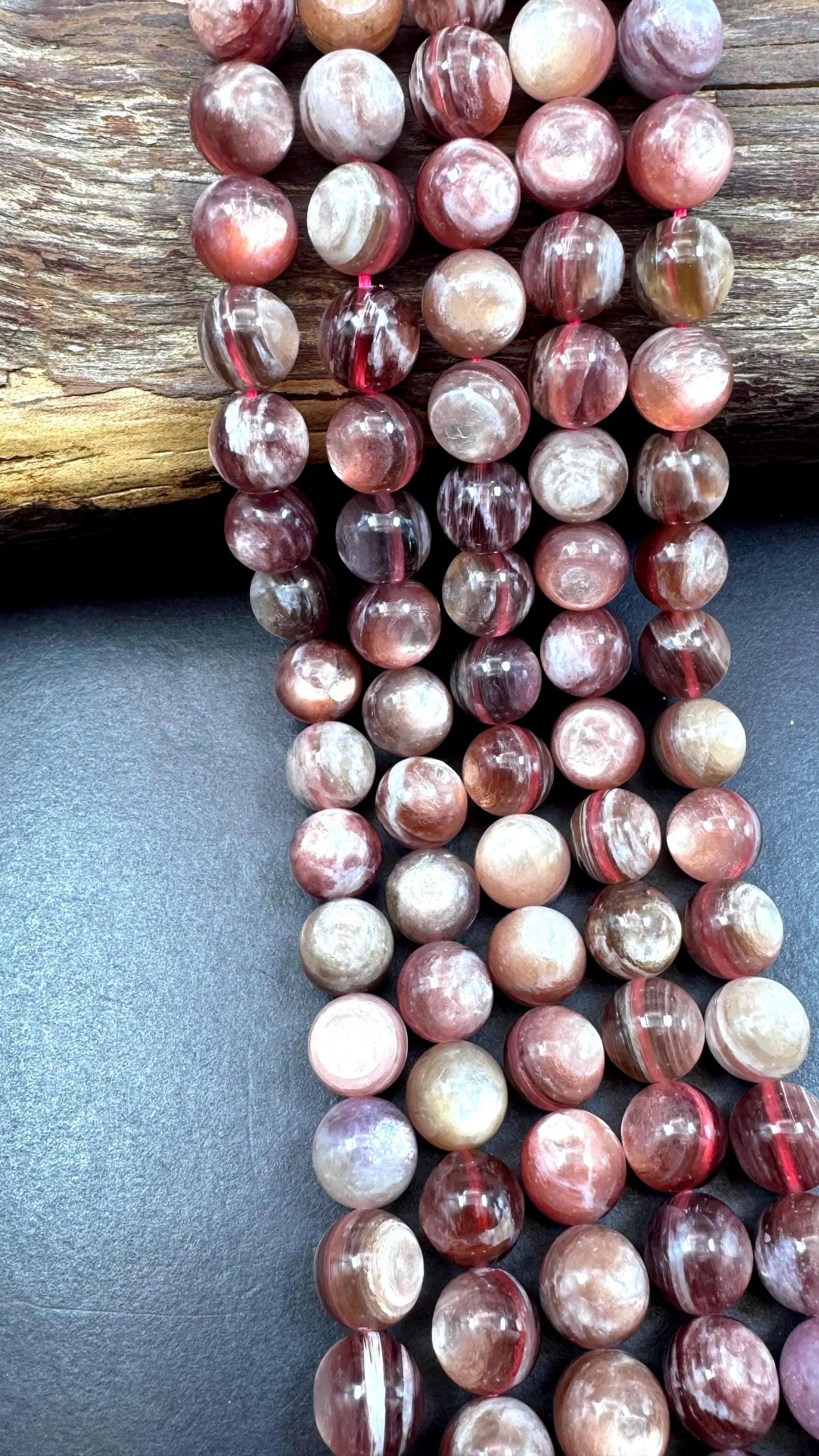 Natural lepidolite mica gemstone beads . Gorgeous natural rainbow flash lepidolite bead. Excellent quality . Full strand 15.5”