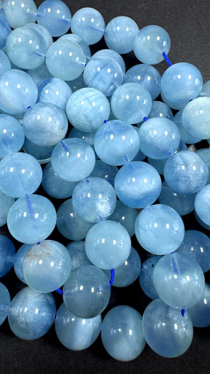 AA Natural Aquamarine gemstone beads. Smooth round shape . Excellent quality full strand 15.5”
