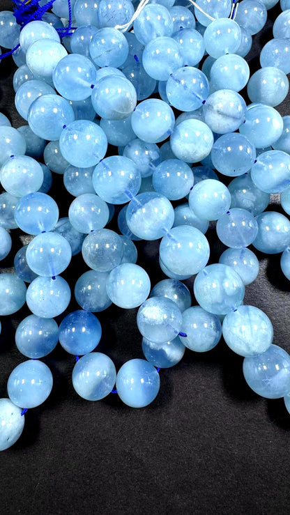 AA Natural Aquamarine gemstone beads. Smooth round shape . Excellent quality full strand 15.5”
