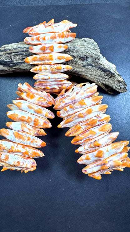 Natural spiny oyster shell bracelet. Gorgeous Natural orange yellow color . Unique shape. Excellent quality.