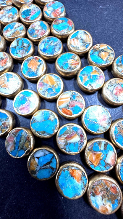 Natural turquoise gemstone bead. With gold copper . Coin shape . Excellent quality . Full strand 15.5”