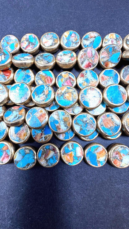 Natural turquoise gemstone bead. With gold copper . Coin shape . Excellent quality . Full strand 15.5”