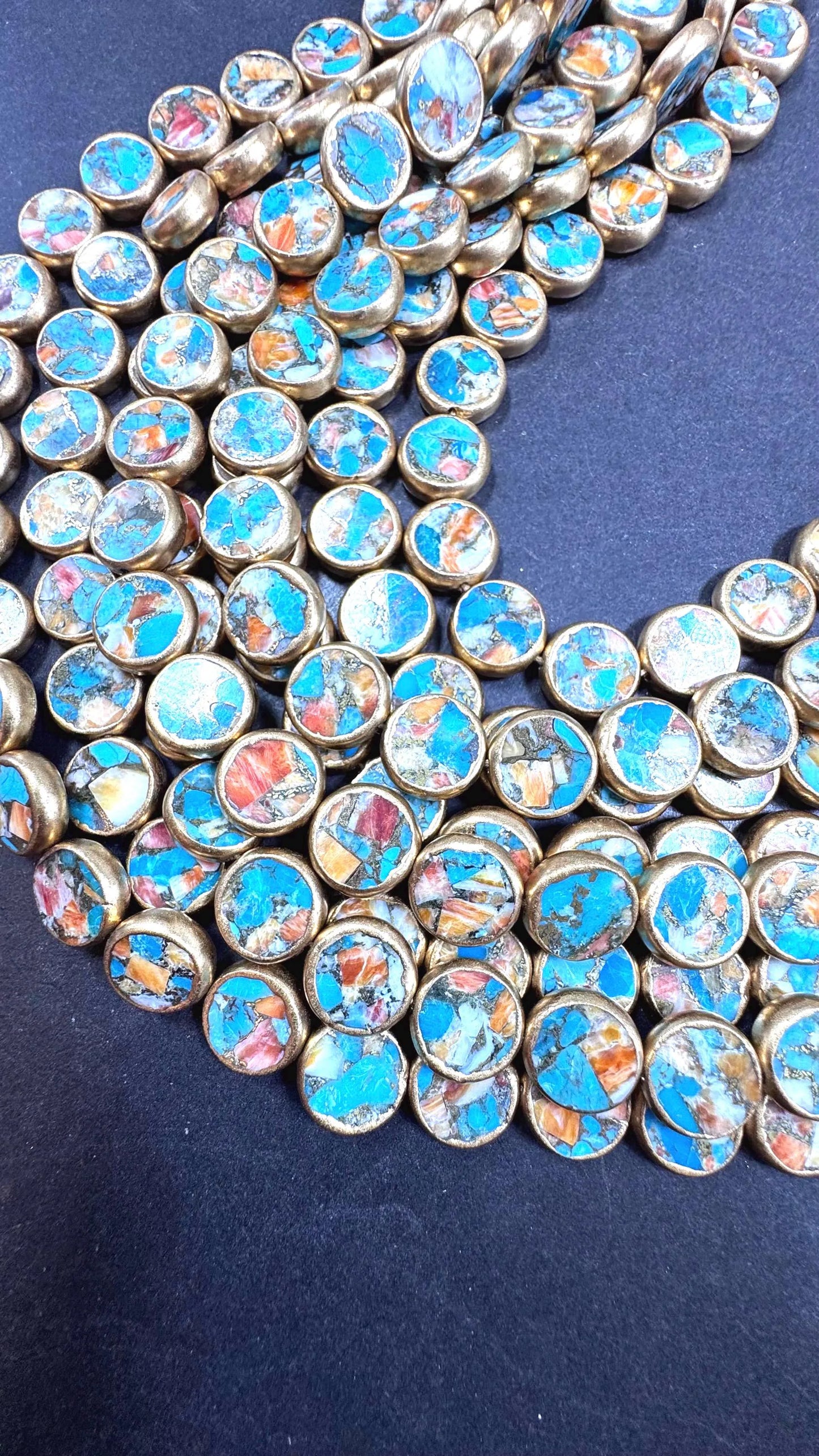 Natural turquoise gemstone bead. With gold copper . Coin shape . Excellent quality . Full strand 15.5”