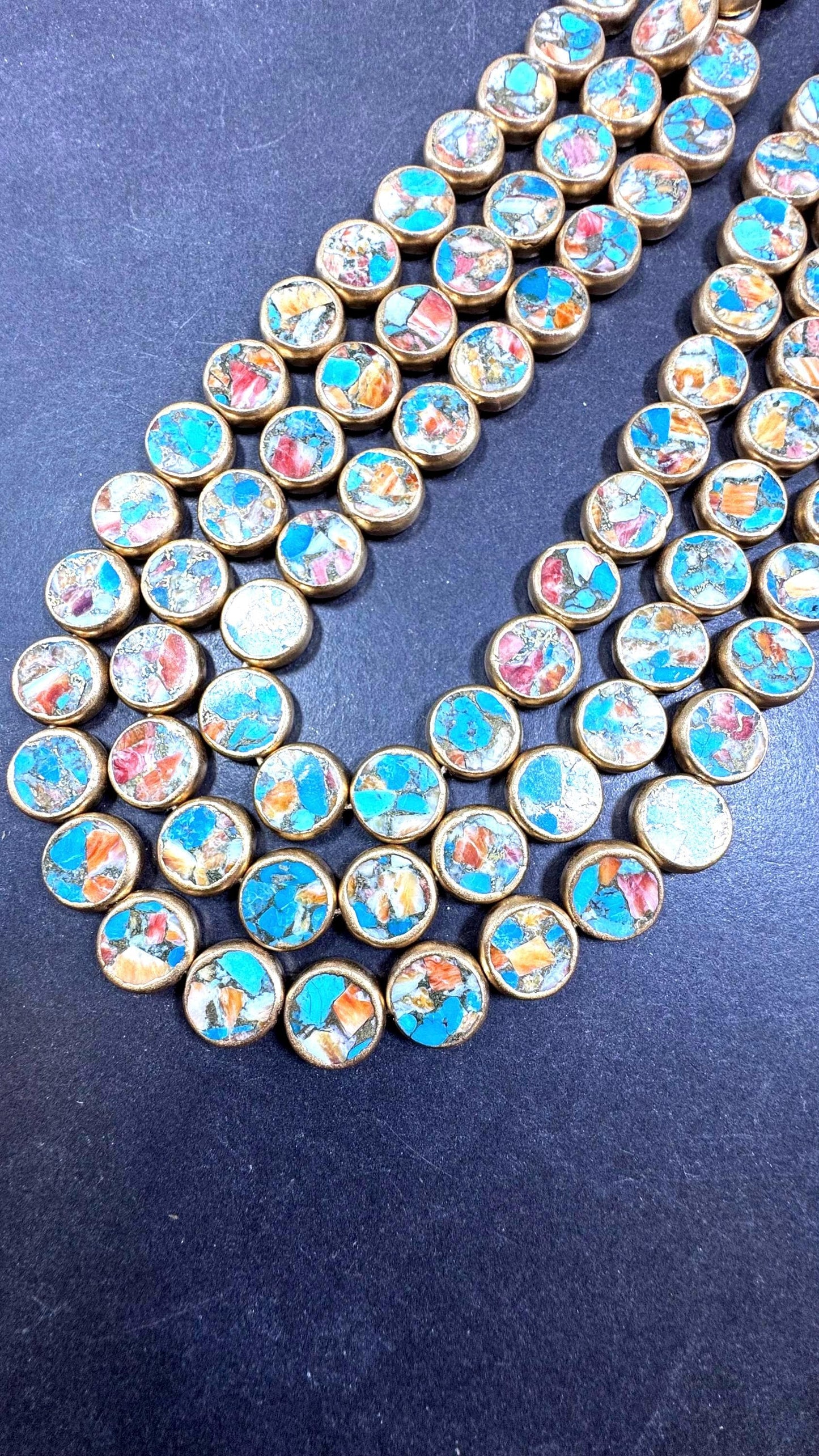 Natural turquoise gemstone bead. With gold copper . Coin shape . Excellent quality . Full strand 15.5”