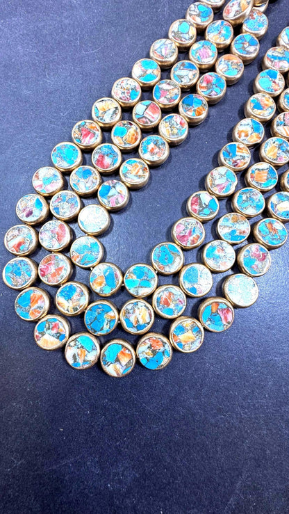 Natural turquoise gemstone bead. With gold copper . Coin shape . Excellent quality . Full strand 15.5”